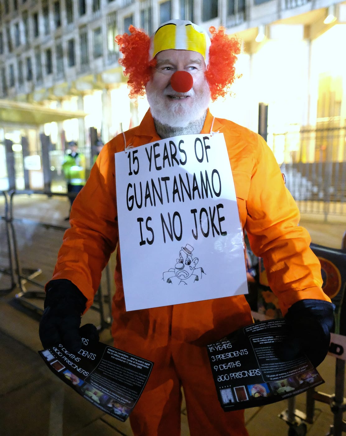 Clown Town — Clown with a reminder about Guantanomo and the dark side of American imperialism during a protest against Trump's inauguration outside the US Embassy in London.. (31627003633)